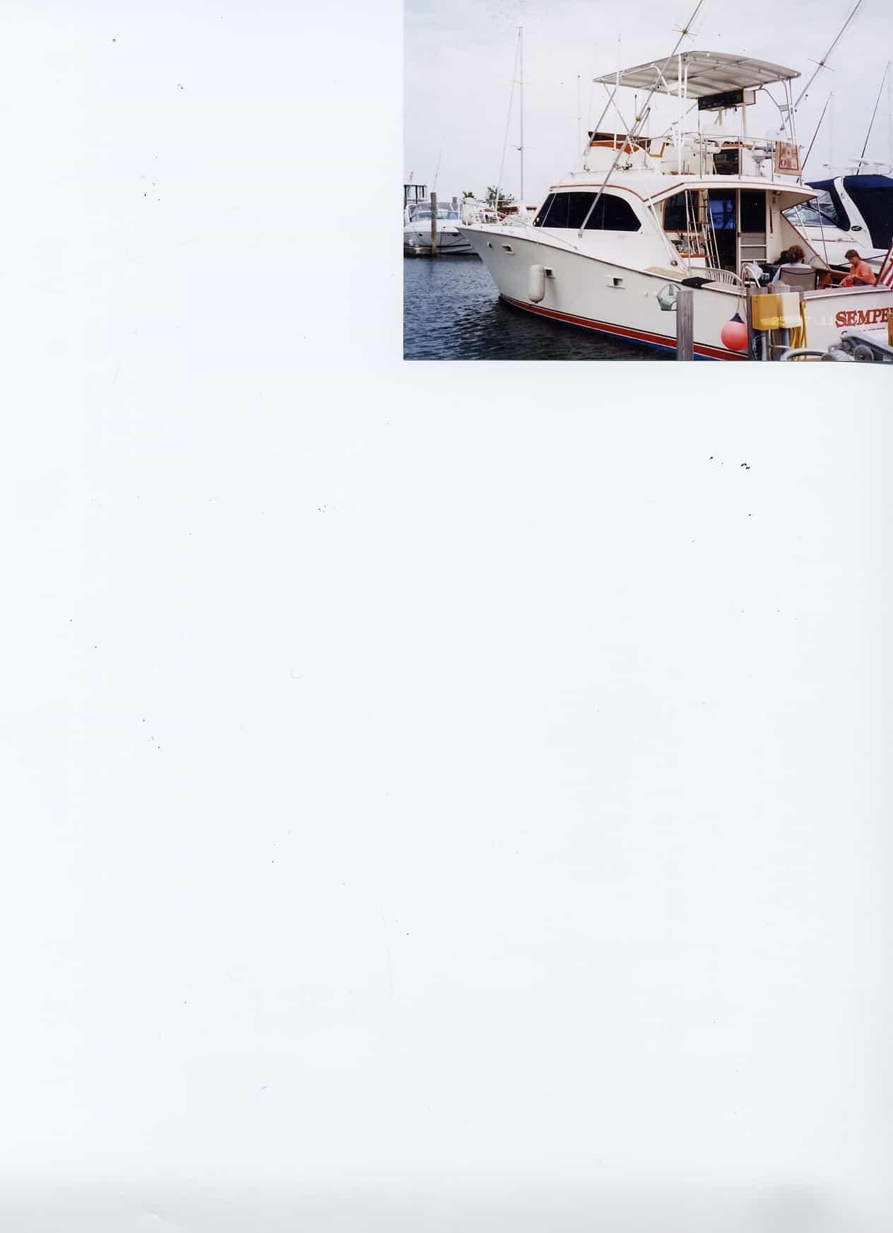 Atlantic Towers Top mounted on a Post Yachts 42 Sport Fisherman at the marina, showcasing its sleek design.