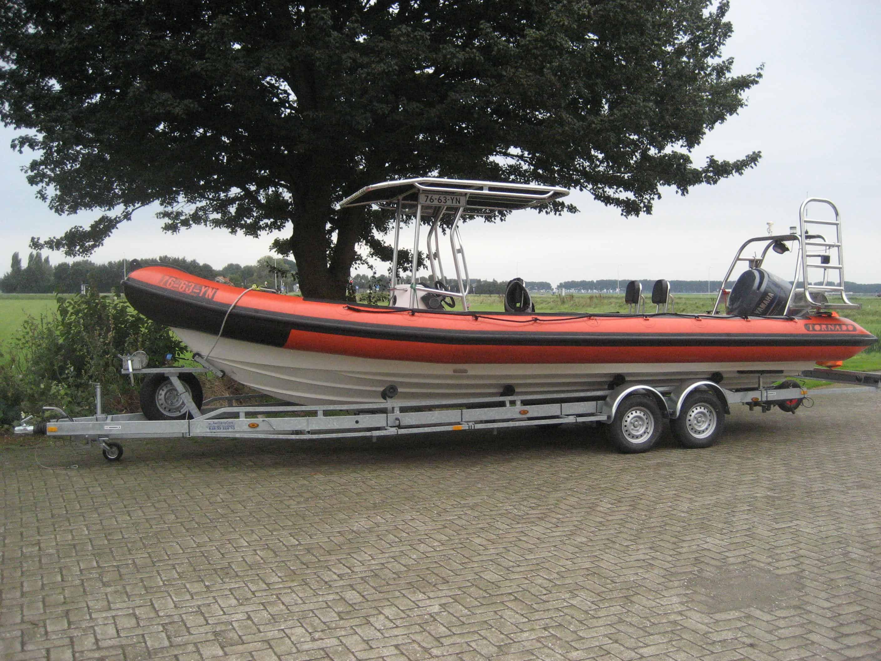 Atlantic Towers T-Top installed on a Tornado 30 RIB, providing shade and support for the boat's activities.