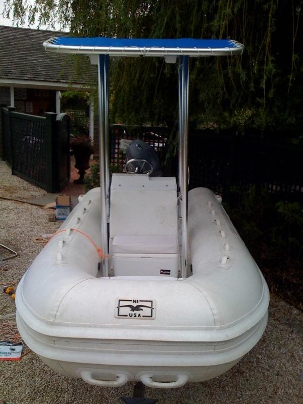 Atlantic Towers T-Top installed on Nautica CC RIB boat, providing shade and support over the helm area.