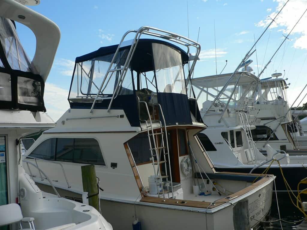 Atlantic Towers Arch installed on a Pacemaker 36 Convertible boat, docked among other vessels.