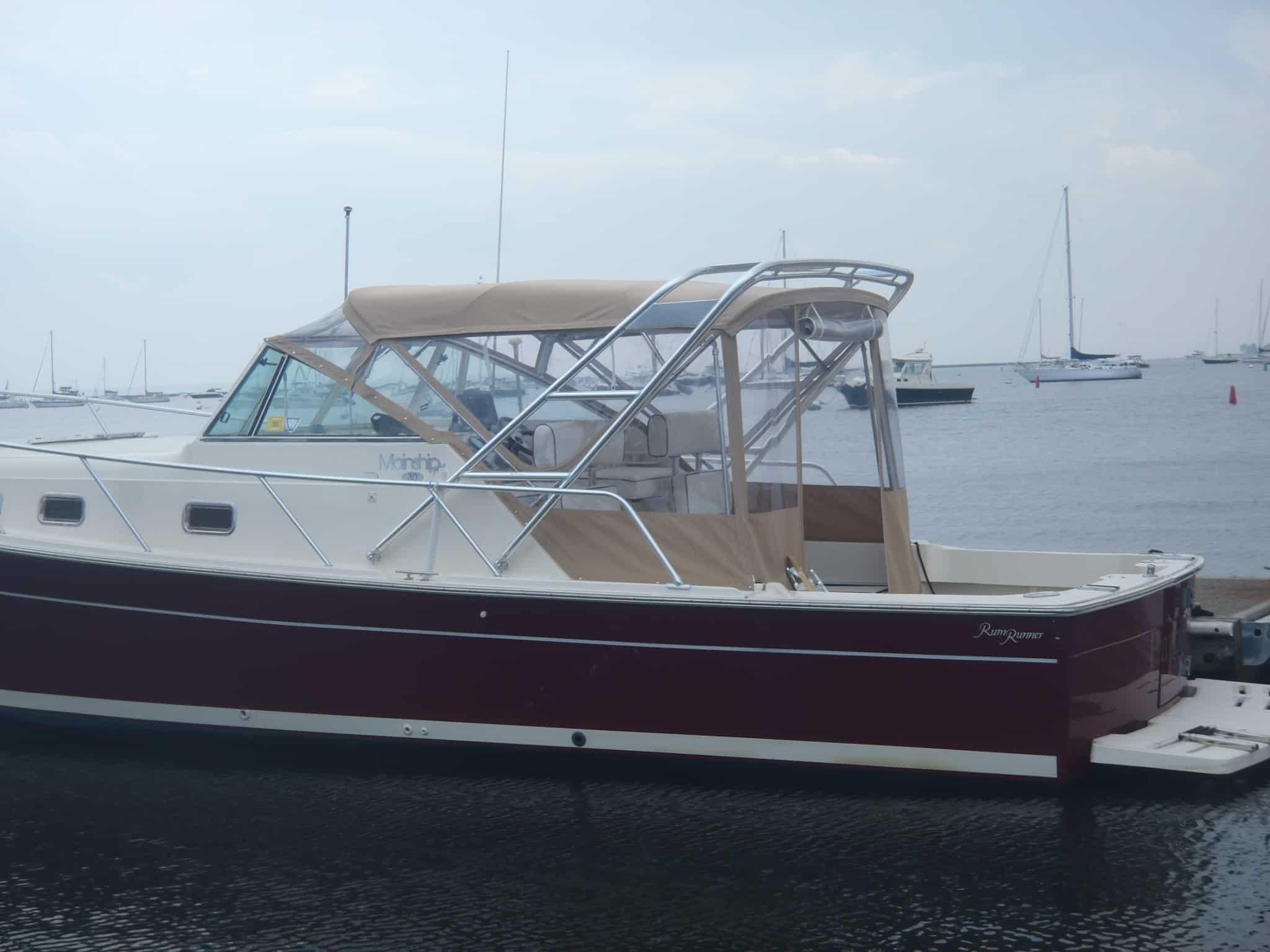 Atlantic Towers arch installed on a Mainship 30 Pilot cruiser, enhancing the boat's design and functionality.