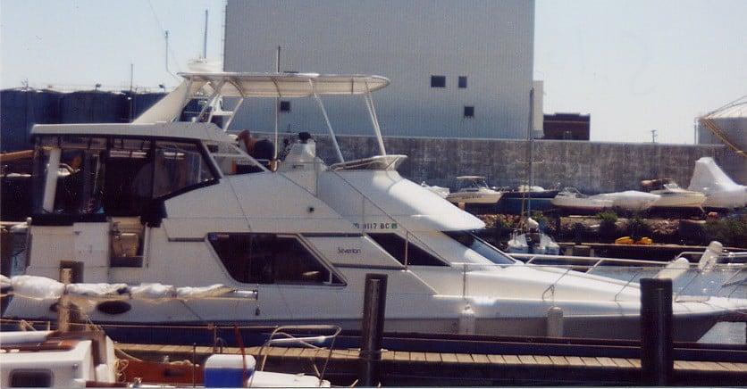 Atlantic Towers Top installed on a Silverton 372/392 Motor Yacht docked at a marina.