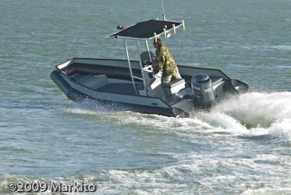 Atlantic Towers T-Top installed on a Rhino Tech 20 Markito center console boat shown from the side.