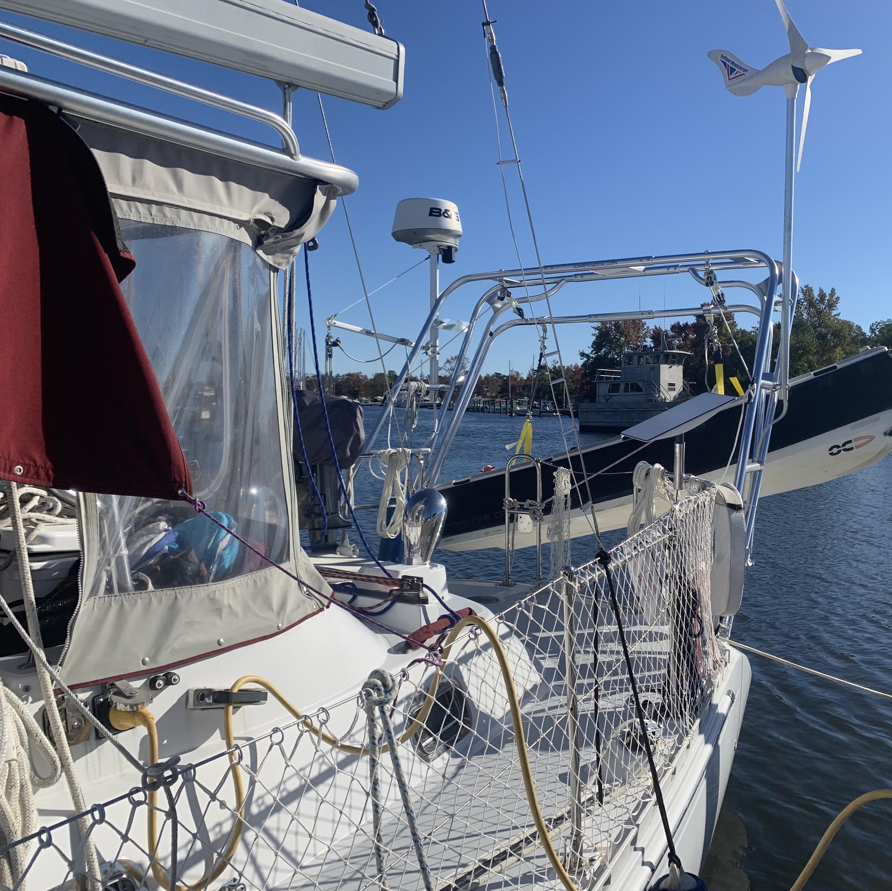 Atlantic Towers Arch installed on a boat with a view of the water and nearby vessels in a marina.