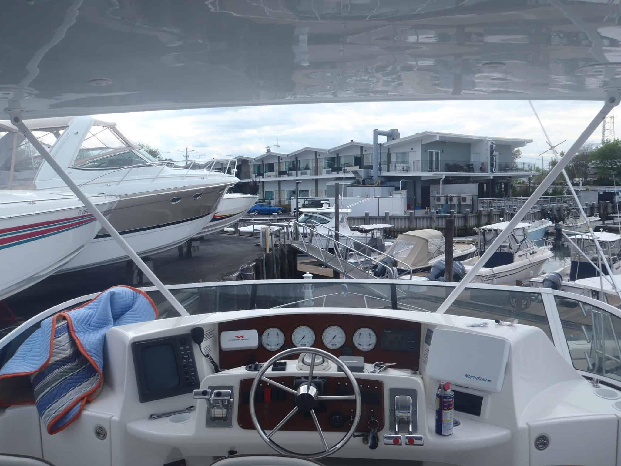 Atlantic Towers Top installed on a Silverton 38 Sport Bridge sedan boat, showcasing a sleek design and functional structure.