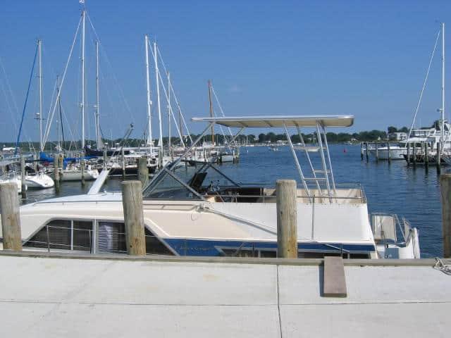 Atlantic Towers top installed on a Chris Craft 350 Catalina Tricabin boat, showcasing its sleek design and functional features.