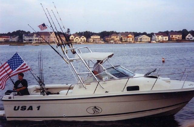 Atlantic Towers Arch installed on a 2302 Trophy fishing boat named USA 1 with multiple fishing rods and an American flag