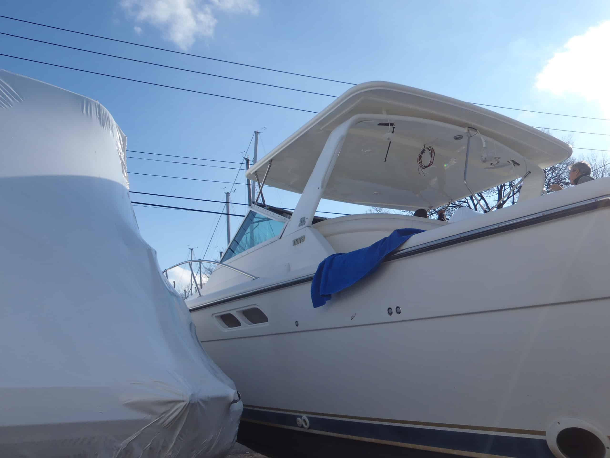 Atlantic Towers Top installed on a Tiara 3100 Open cruiser showing the boat’s helm and seating area.