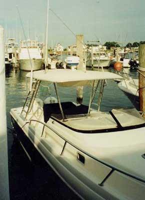 Atlantic Towers Accessories installed on an Intrepid 289 Walkaround boat at a marina.