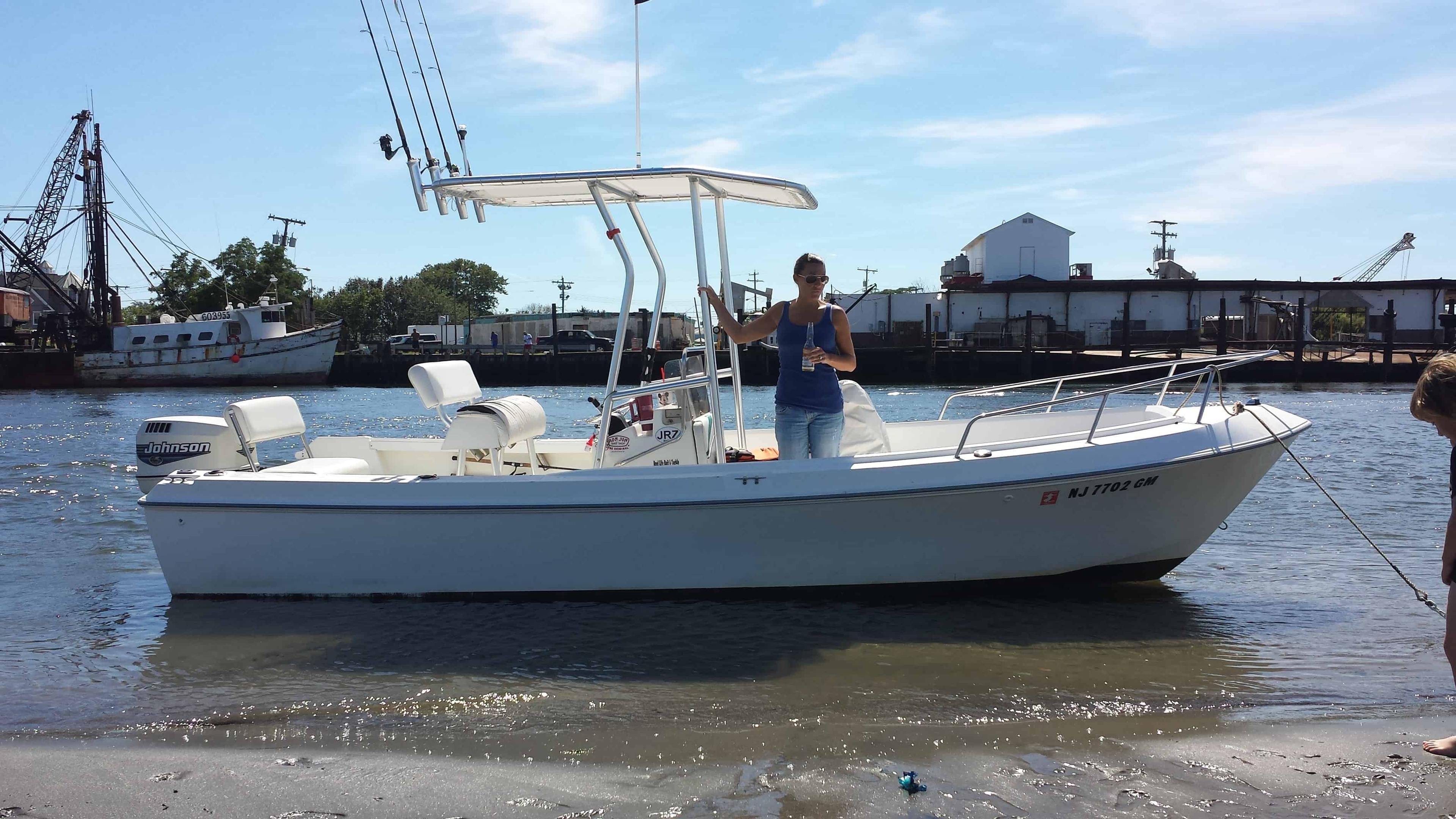 Atlantic Towers T-Top on an Aquasport 200 Osprey center console boat, showcasing its sleek design and functionality.