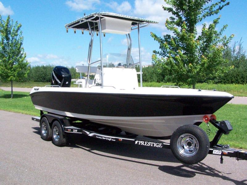 Atlantic Towers T-Top installed on a Yar-Craft 219CCX center console boat shown in a dock setting.