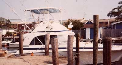 Atlantic Towers top installed on a Bertram 35 Convertible boat, showcasing its sleek design and functionality.