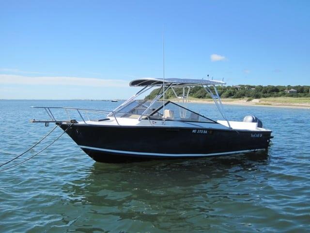Atlantic Towers top on a Sea Craft 23 Sceptre cuddy boat, showcasing a sleek design for enhanced functionality.