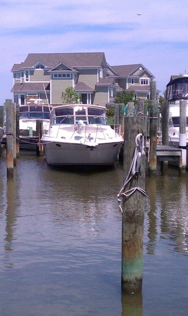 Atlantic Towers Top installed on a Regal 380/400/402 Commodore express boat, shown on water.