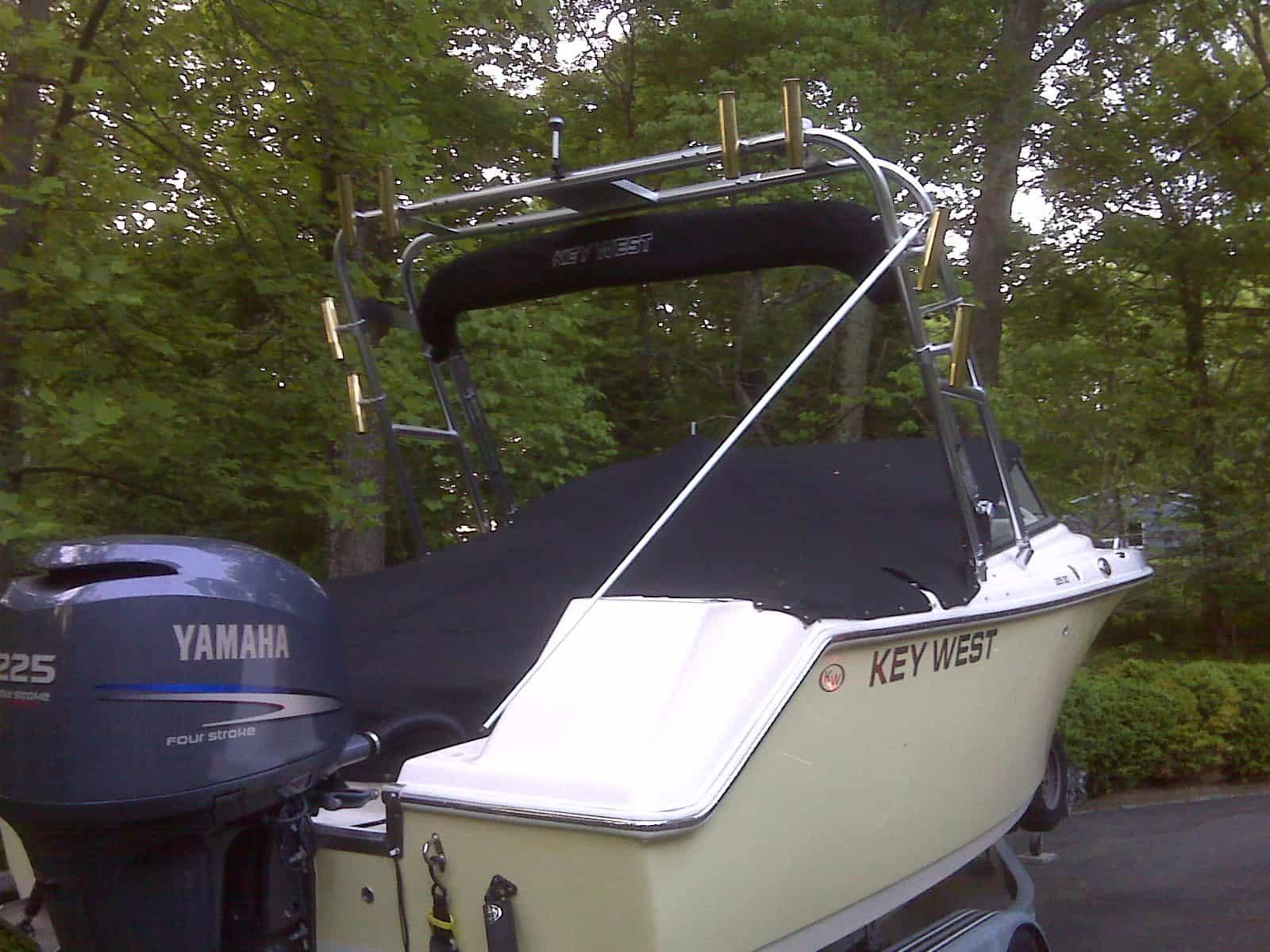 Atlantic Towers Arch installed on a Key West 225 DC dual console boat shown in a docked outdoor setting.