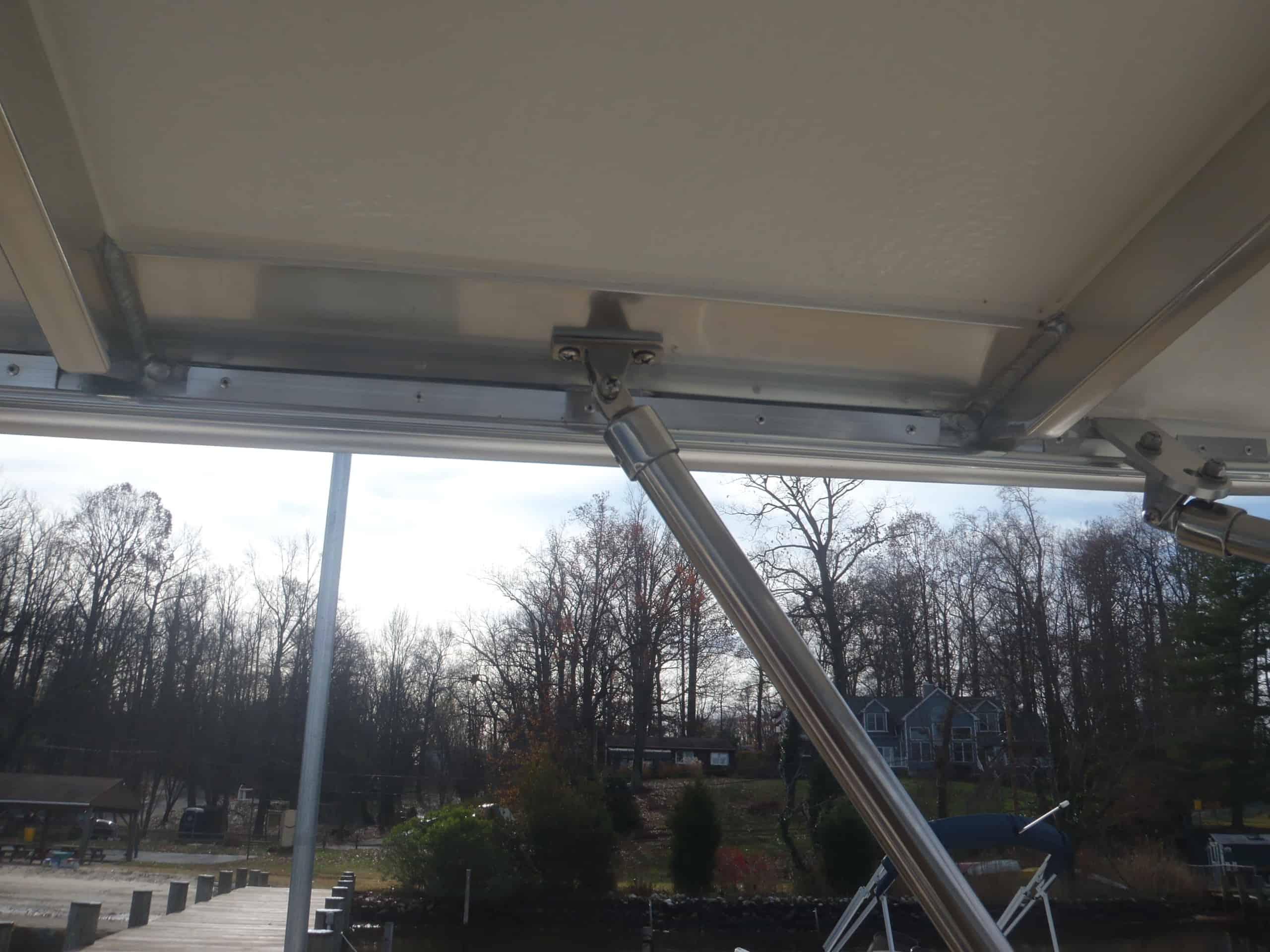 Atlantic Towers Top installed on a Mainship 30 Pilot cruiser, highlighting its design and functionality on the boat.