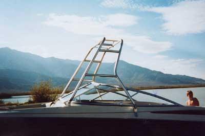Atlantic Towers Air Tower installed on the bow of a Maxum 1900 SR boat with mountainous background.