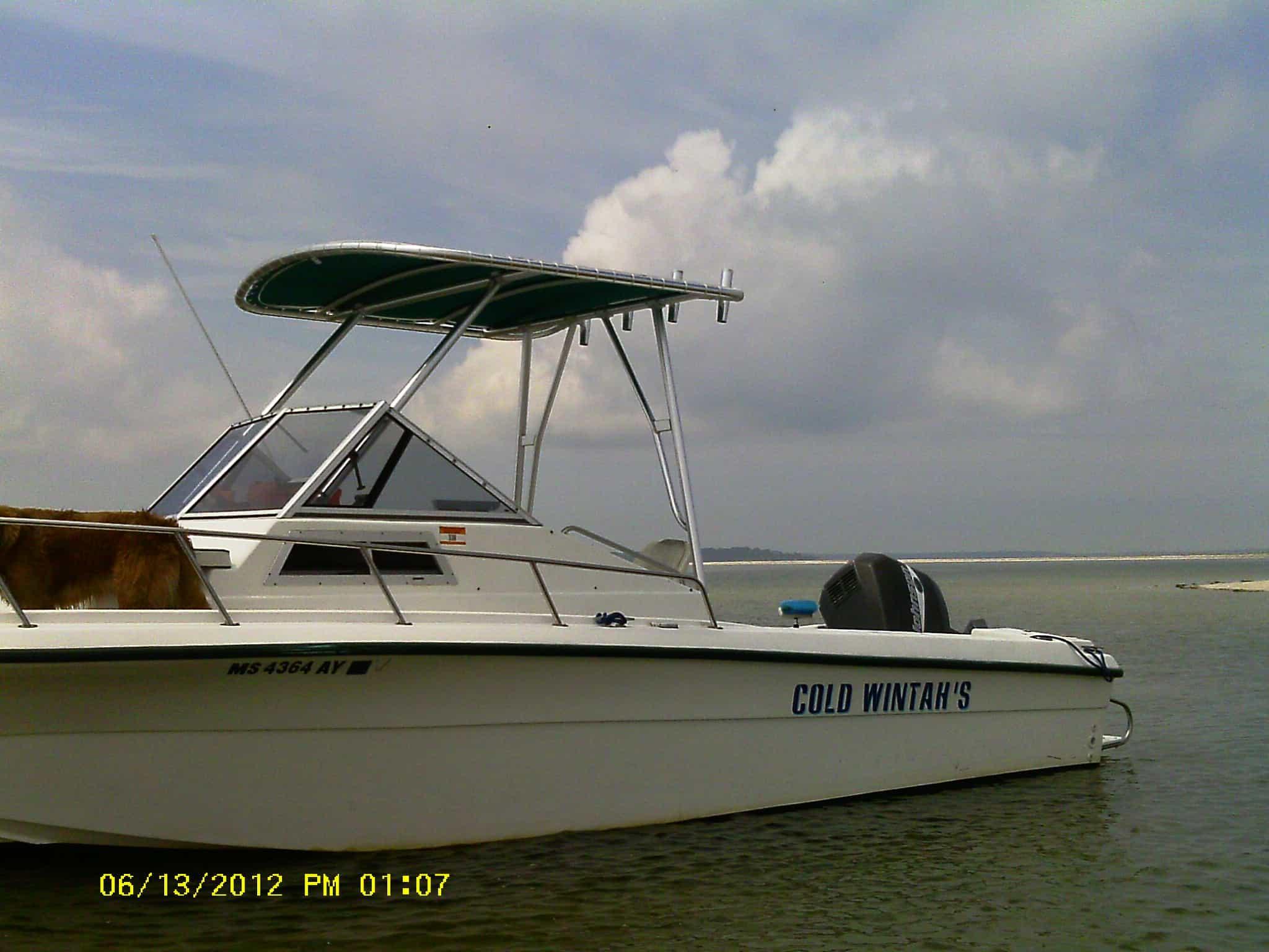 Atlantic Towers Top installed on an Angler Boats 220 walkaround boat, showing aluminum frame and canvas top.