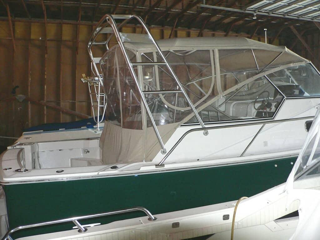 Atlantic Towers arch installed on a Mainship 34 Pilot boat, showcased in a garage setting.