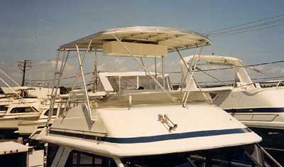 Atlantic Towers Top installed on a Chris Craft 360 Sport Sedan boat, showcasing its design and structure.