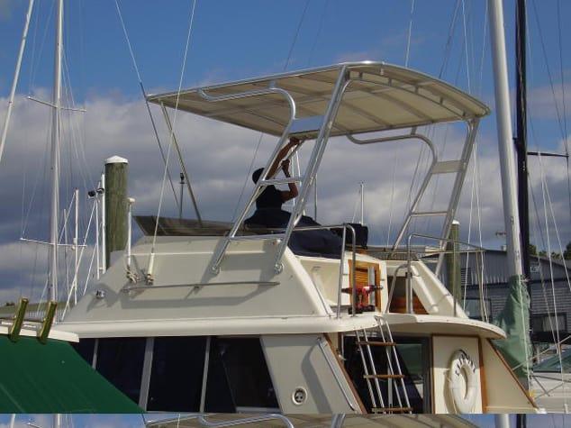 Atlantic Towers Top installed on a Silverton 37C Convertible boat, showcasing a sleek design for enhanced functionality.