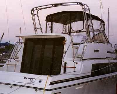 Atlantic Towers arch installed on Carver 32/330 Mariner boat showing the rear deck and covered flybridge area