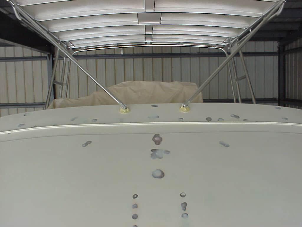 Atlantic Towers Top installed on a Chris Craft Commander FB, showing the boat's upper deck view and structural details.