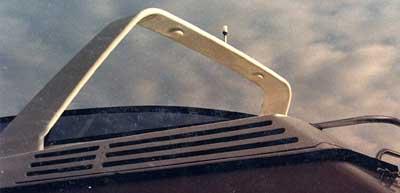 Atlantic Towers Arch installed on the Mainship 35 Convertible boat, shown against a cloudy sky background.