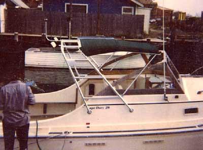 Atlantic Towers Arch installed on a Cape Dory 28 Open Fisherman boat at a marina.