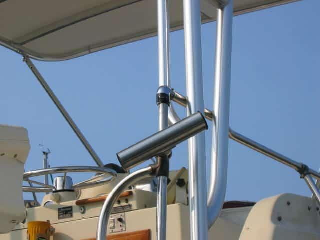 Atlantic Towers Top installed on a Viking 33 boat, showcasing the stainless steel framework and steering equipment.