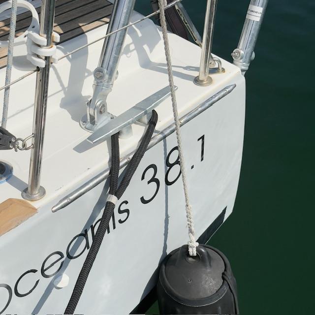 Atlantic Towers Arch installed on the stern of a Beneteau Oceanis 38.1 boat, showcasing marine hardware.