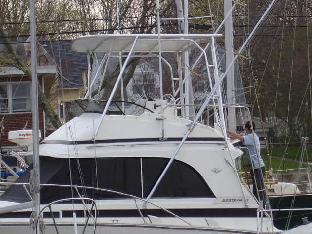 Atlantic Towers Top on a Bertram 33 Flybridge Cruiser convertible boat, showcasing sleek design and functionality.