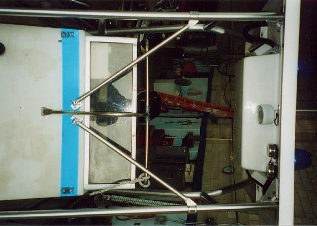 Atlantic Towers T-Top installed on a Boston Whaler 22 Outrage center console boat in a marina setting