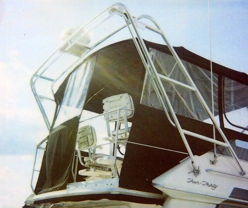 Atlantic Towers arch on a Sea Ray 430/440 Convertible boat with a canopy and seating area visible.