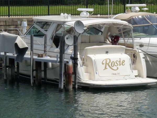 Atlantic Towers Top installed on a Tiara Express boat docked at a marina, named "Rosie.