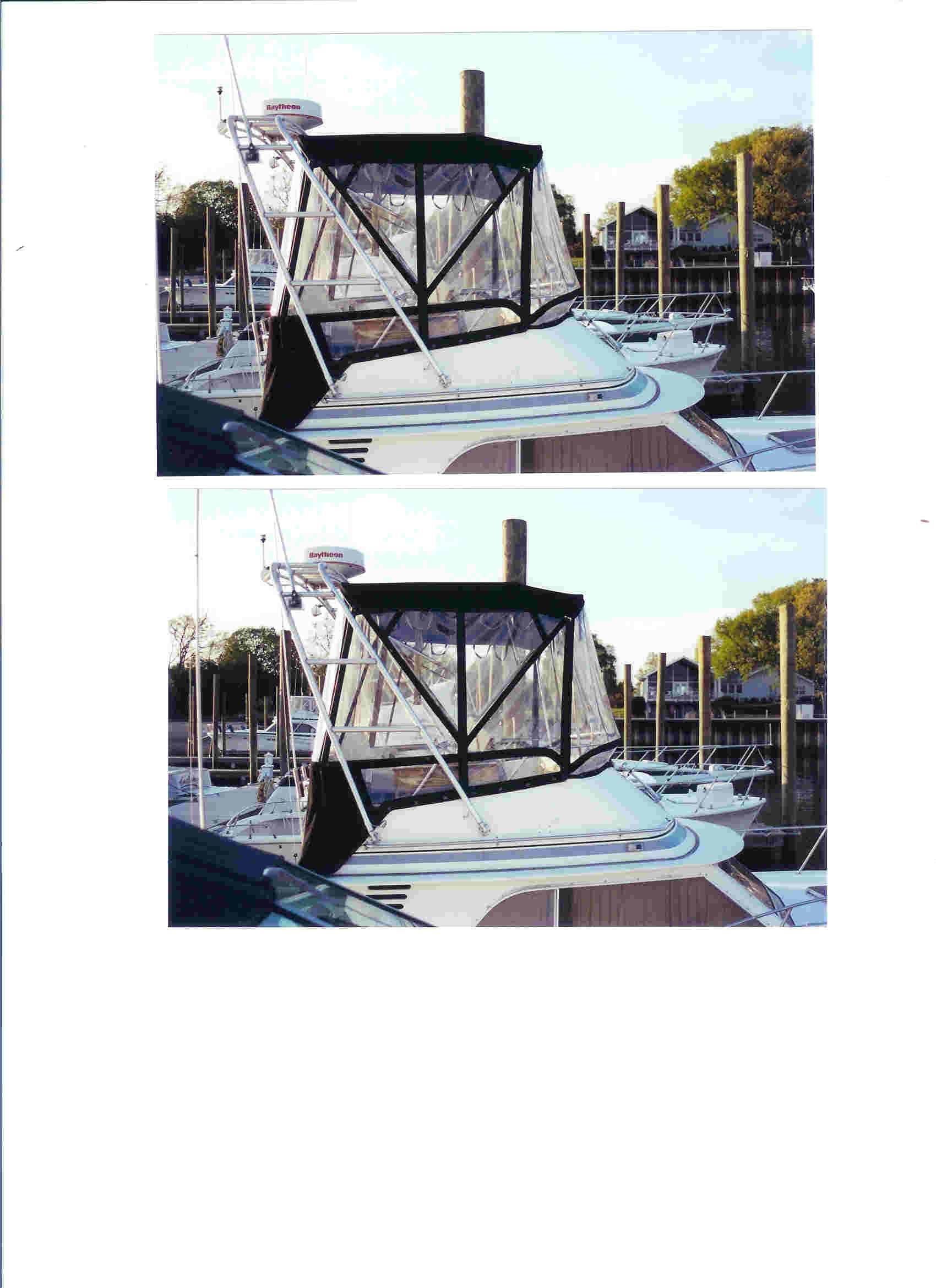 Atlantic Towers arch installed on a Blackfin boat, featuring a black canvas and transparent panels at the marina.