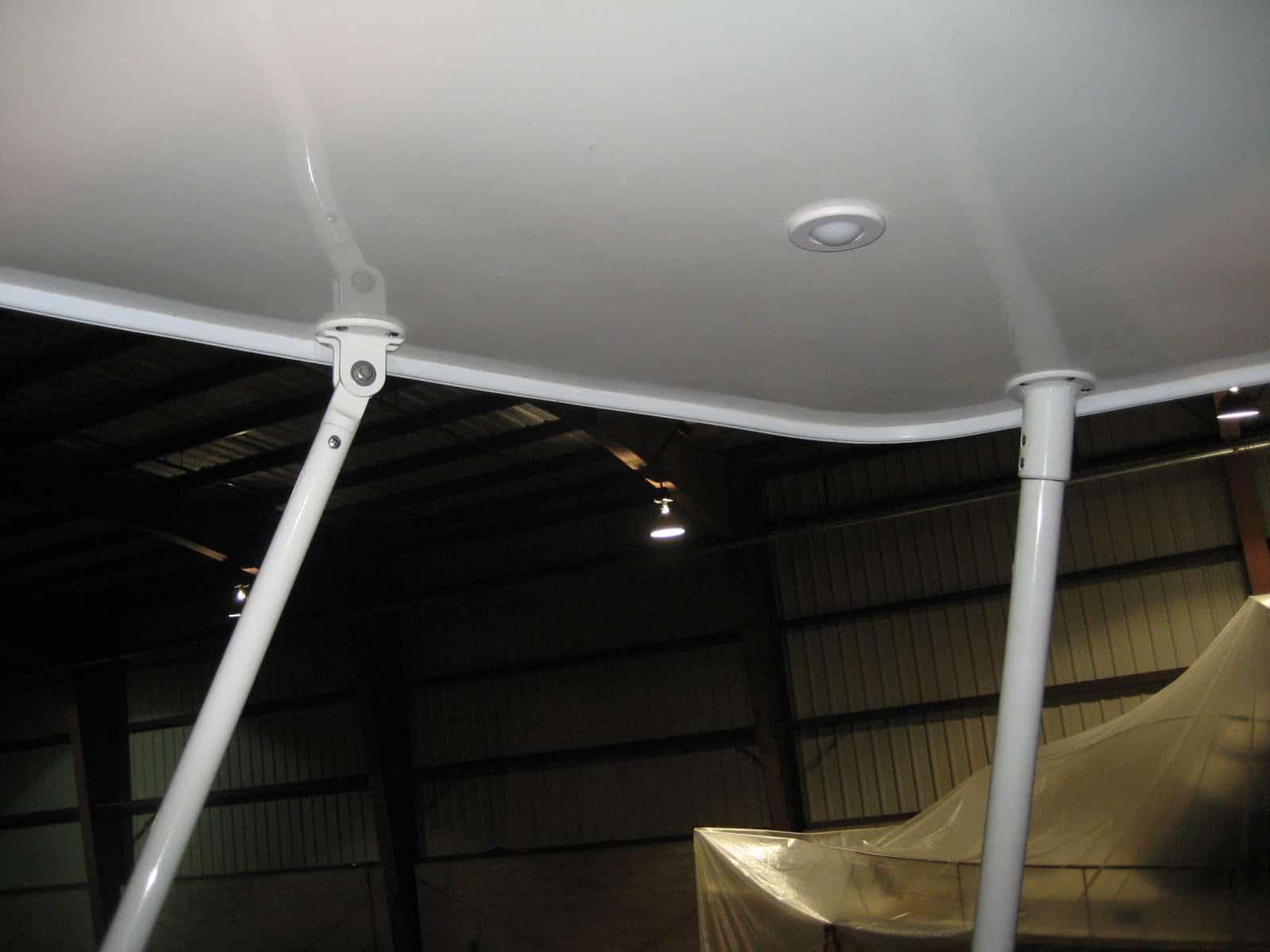 Atlantic Towers Top installed on Silverton 37C convertible boat with seating and helm station visible.