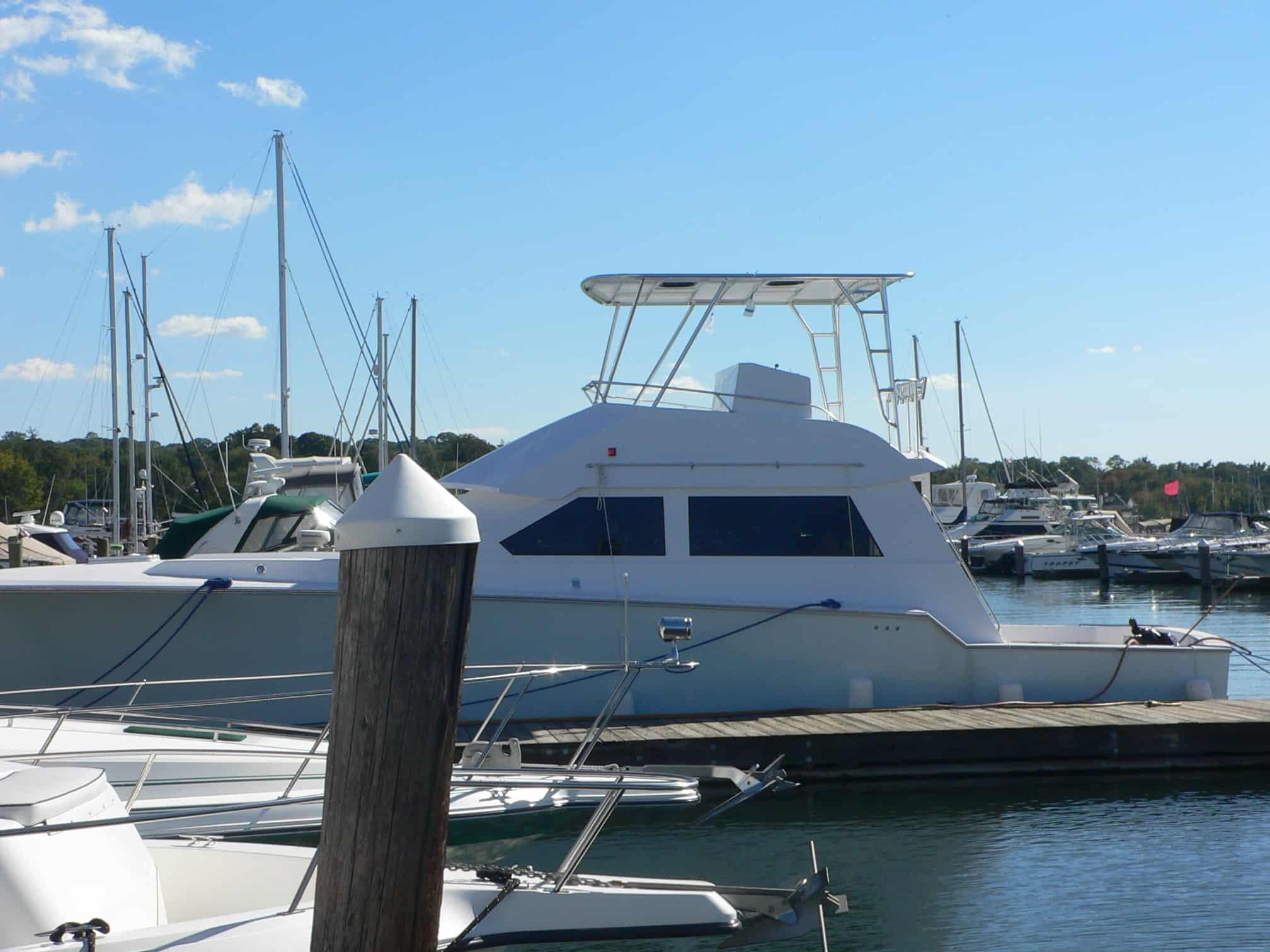 Atlantic Towers Top installed on a Vista 48/50 Sportfisherman convertible boat, showcasing its design and functionality.