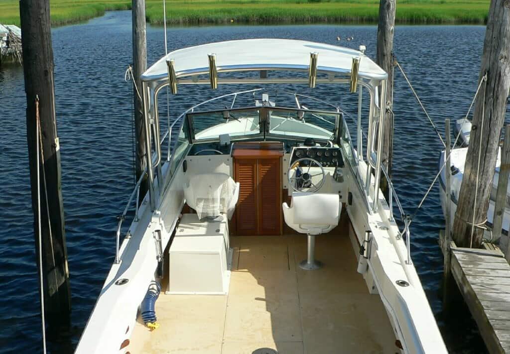 Atlantic Towers Top installed on a Wellcraft 248 Offshore boat with a view of the helm and seating area.