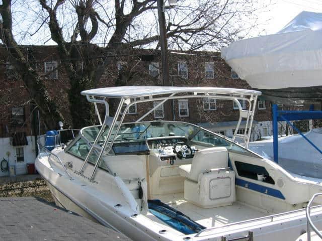 Atlantic Towers Top installed on a Sea Ray 300 Weekender boat, showcasing the cockpit and helm area.