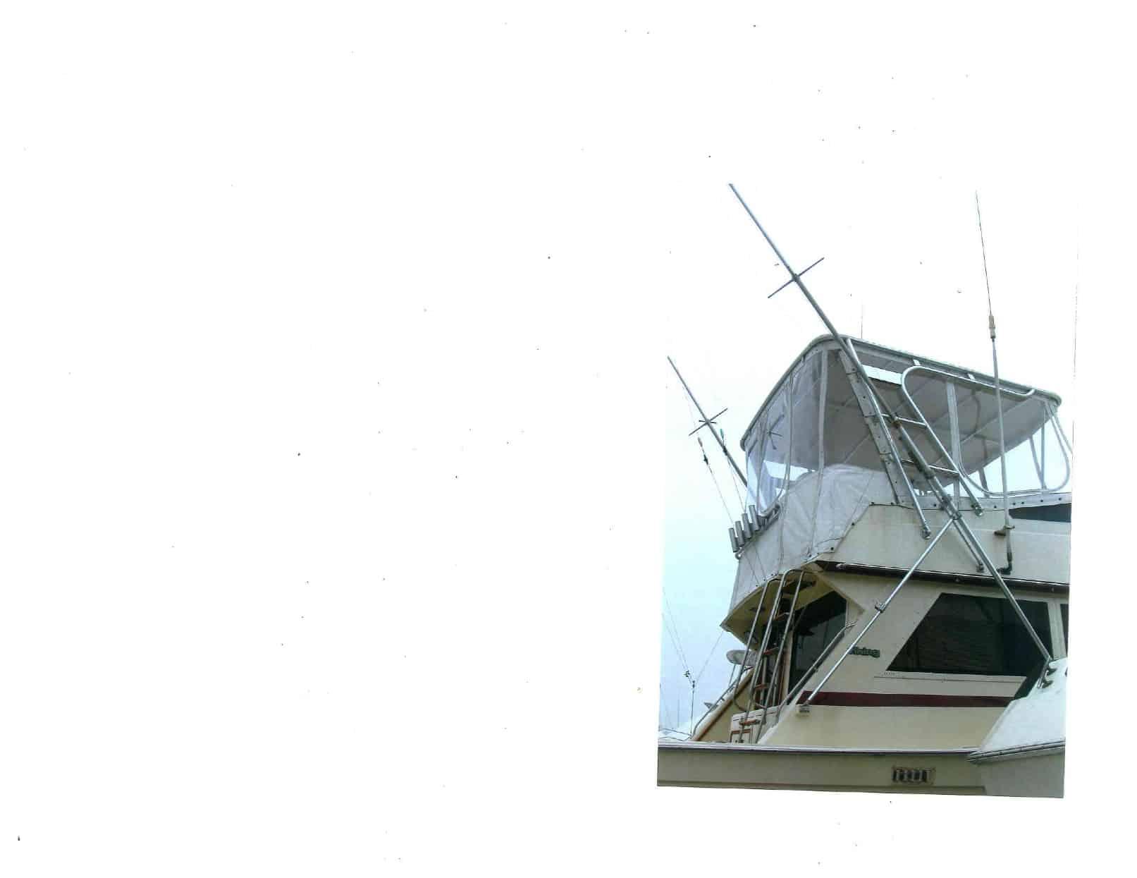 Atlantic Towers Top installed on a Viking 35 Convertible boat, showcasing the cabin and fishing gear setup.