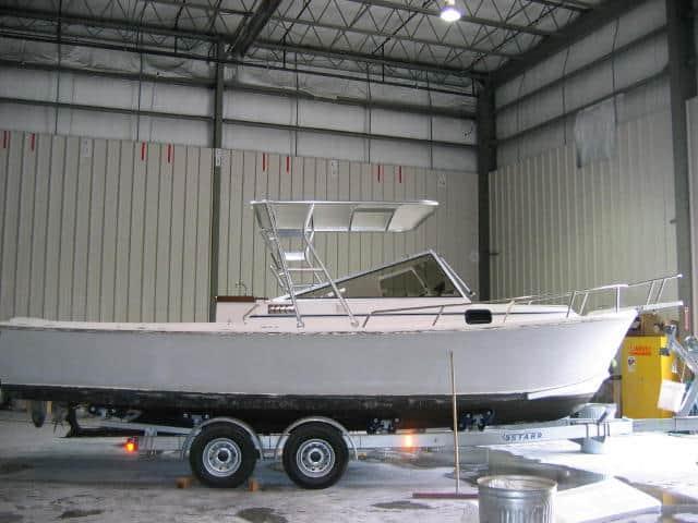 Atlantic Towers Top installed on a Shamrock 26 Predator boat in a workshop setting.