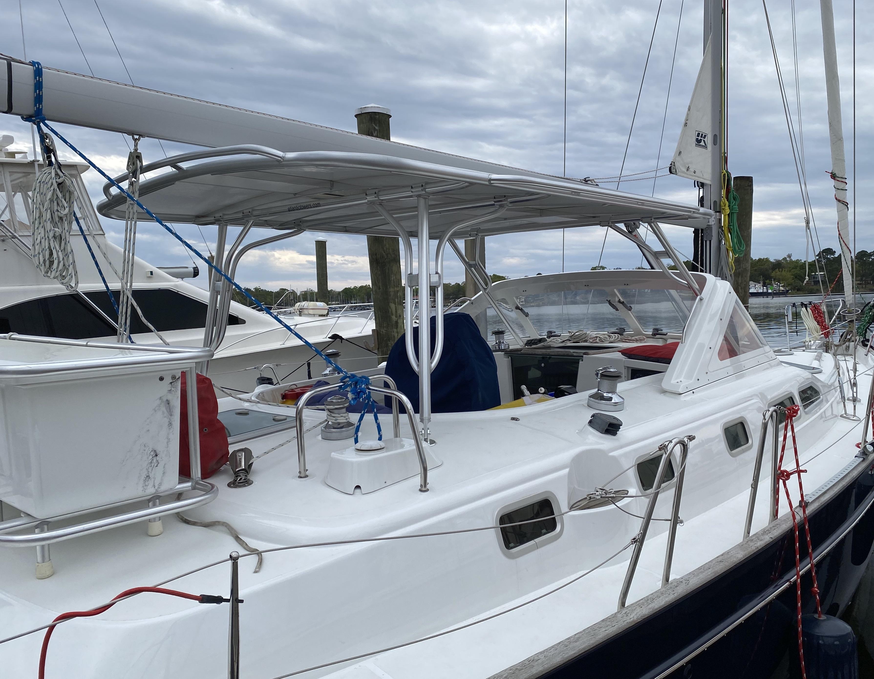 Atlantic Towers Top installed on a sailing boat, showing the helm area and docked setting.