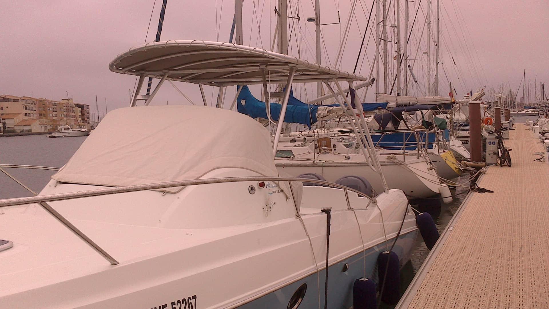 Atlantic Towers Top installed on a Jeanneau 7.5 Cuddy boat, featuring a sleek and functional design.