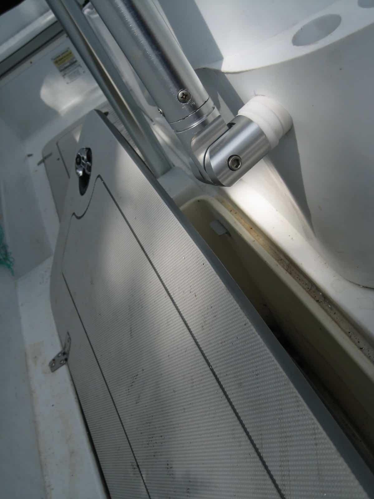 Atlantic Towers T-Top installed on a Triumph 21 center console boat, providing shade and support for fishing activities.