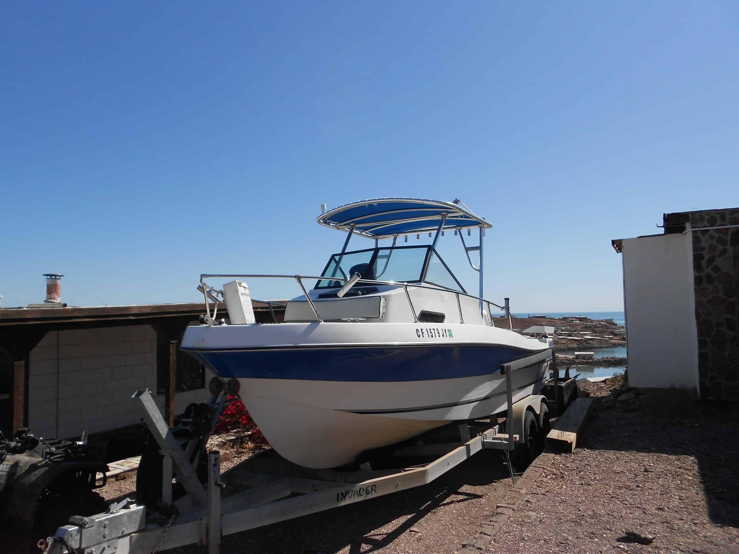 Atlantic Towers top on Invader 245 walkaround boat, featuring a sleek design and functional attributes.