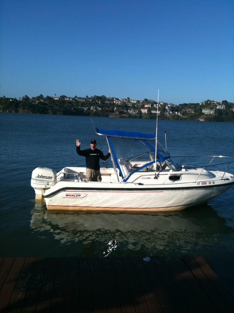 Atlantic Towers Top installed on a Boston Whaler 21 Conquest cuddy fish boat showing the rear view and mounted equipment.