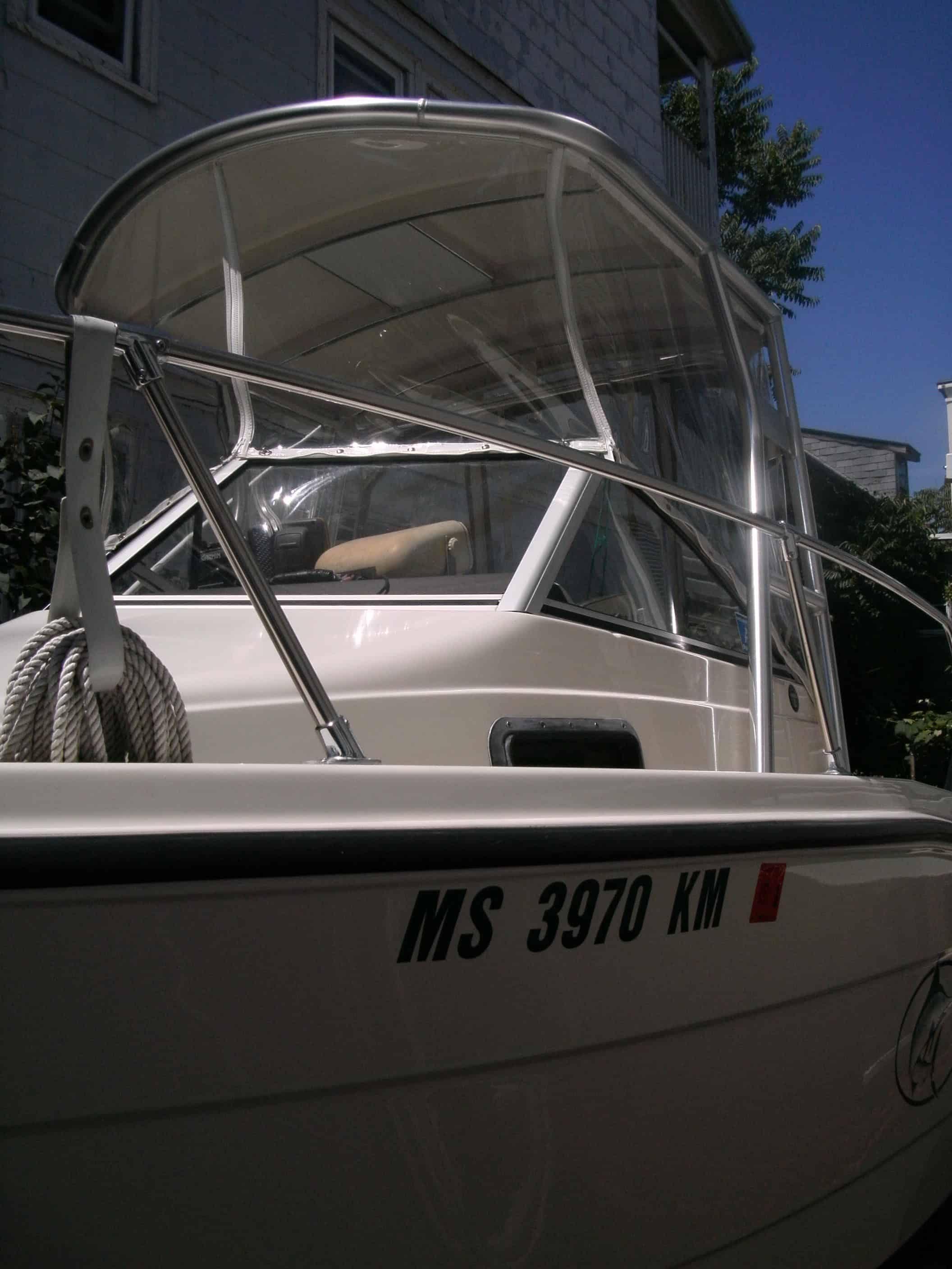 Atlantic Towers Top installed on a Trophy 1802 Walkaround boat showing the front deck and railing with registration number MS 3970 KM.