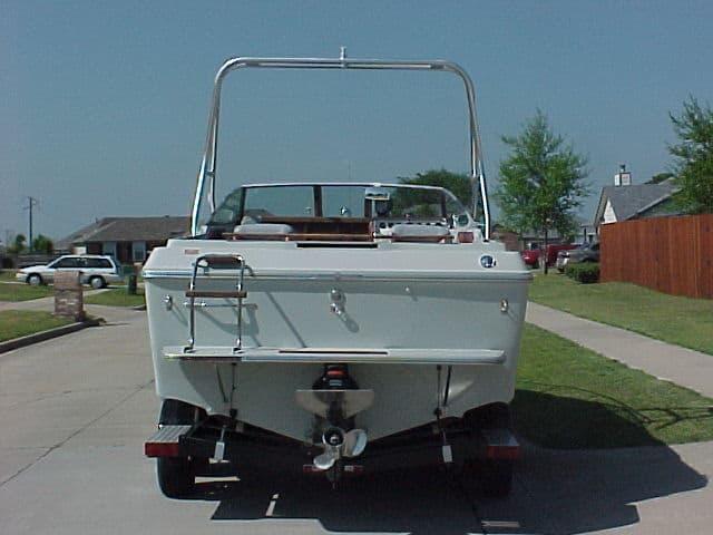 Atlantic Towers Air Tower installed on a white Sea Ray 210 boat, parked on a driveway.