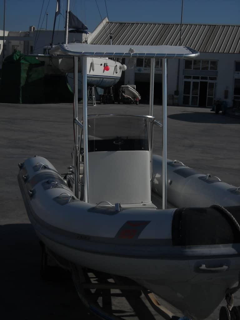 Atlantic Towers T-Top installed on a Marsea SP90 RIB boat, providing shade and support on the water.